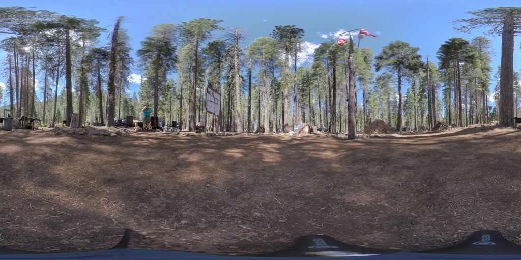 This is a 360-degree image of the flags area of White Fir Campsite at Camp Wolfeboro.